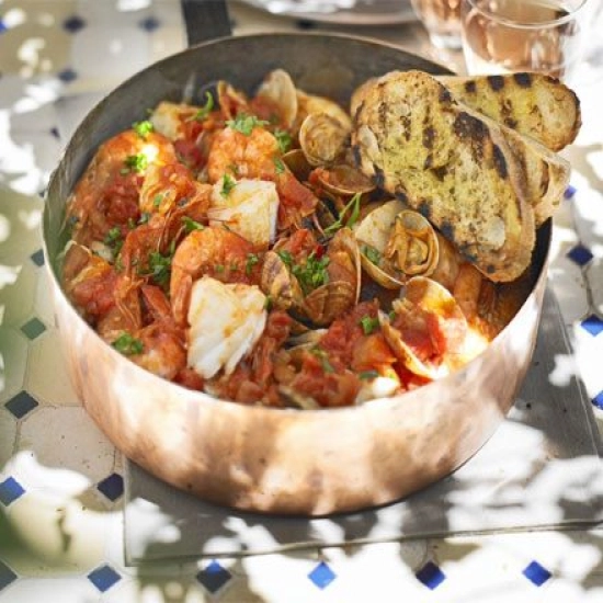 Mediterranean fish stew with garlic toasts