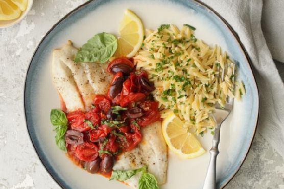 Baked Fish with Cherry Tomato Olive Sauce + Lemon Chive Asiago Orzo