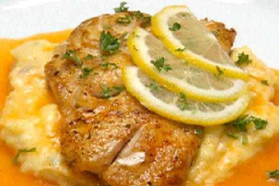 Cajun Snapper and Shrimp over Bacon Cheddar Cheese Grits with Red Pepper Coulis